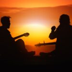men, guitars, silhouettes, instruments, musical instruments, guitarists, playing guitar, playing music, sunset, dusk, nature, twilight, orange sky